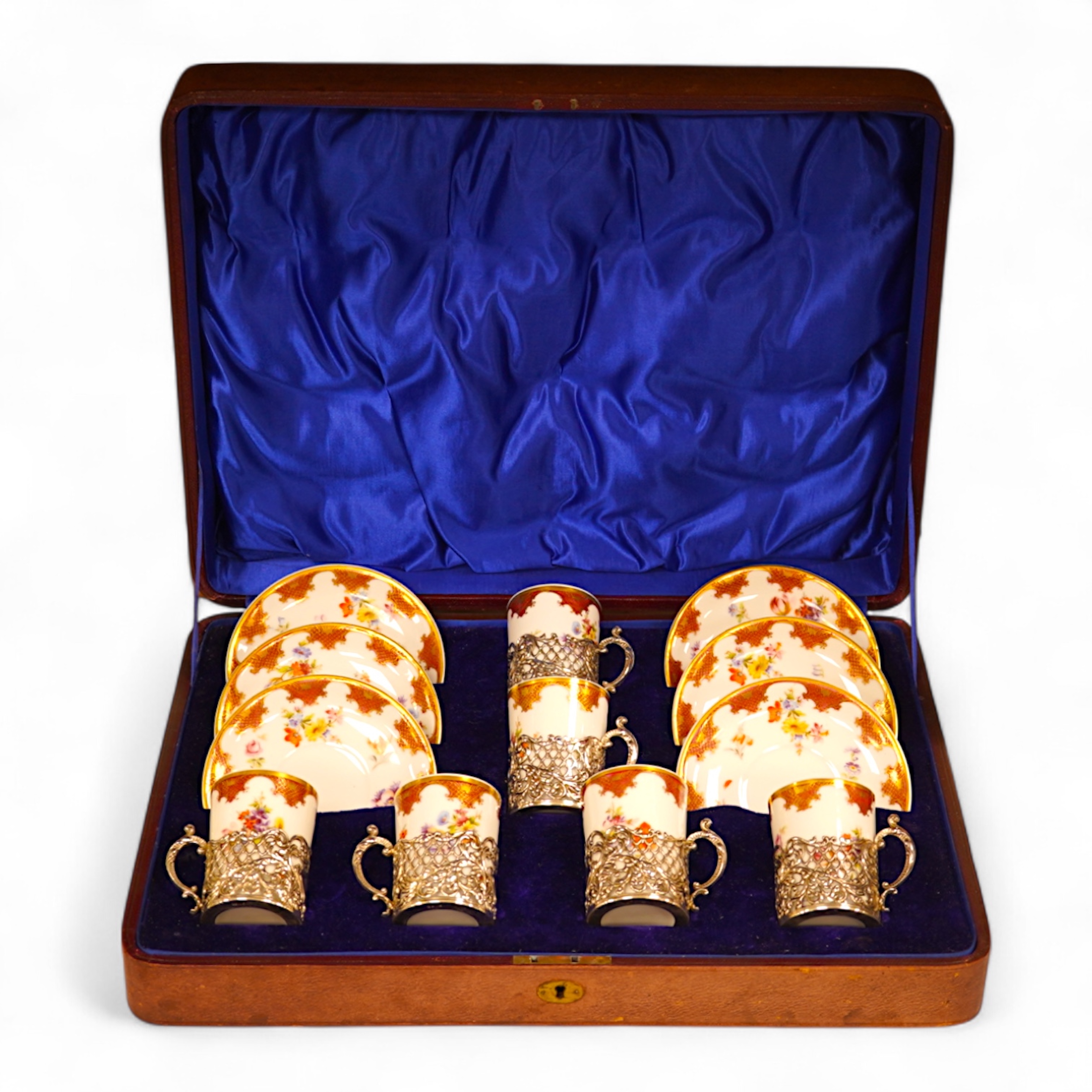 A cased Wurttemberg porcelain coffee set, silver mounted, 40cm wide